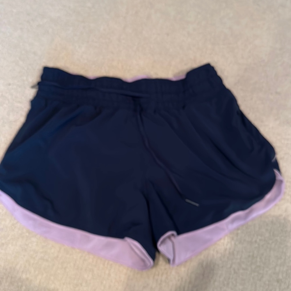 Lululemon women’s shorts. Reversible navy/pink